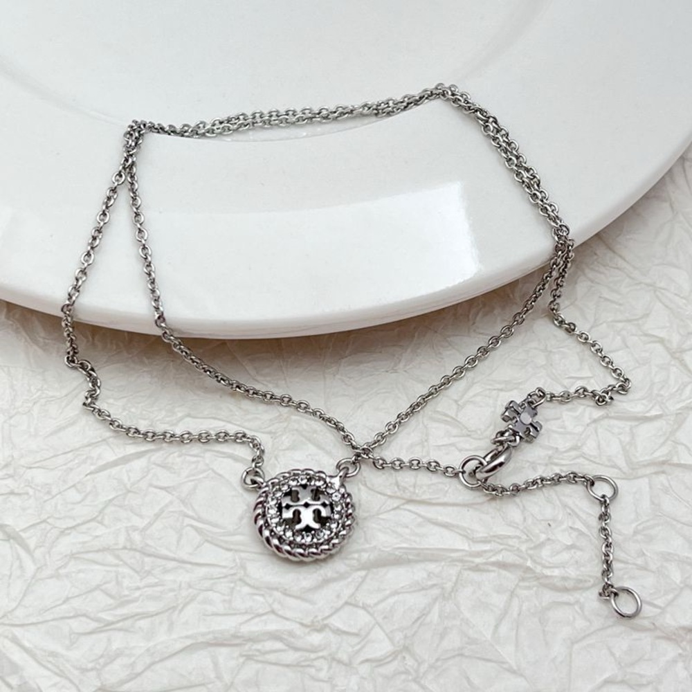 Tory Burch Elegant Silver Pendant Necklace